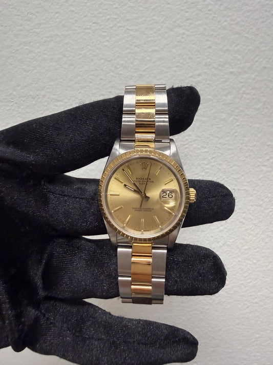 Rolex Oyster Perpetual Date Champagne Stick Dial on Strap Ref 15223 with Papers 1990