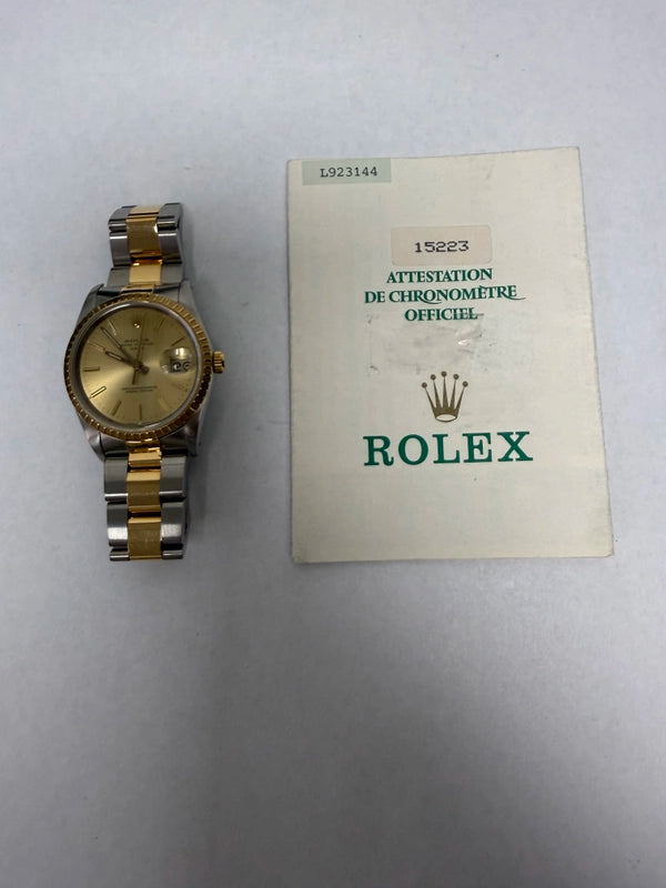 Rolex Oyster Perpetual Date Champagne Stick Dial on Strap Ref 15223 with Papers 1990
