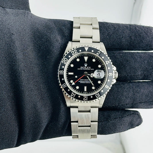 Rolex GMT-Master Black Dial on Oyster Ref 16700 with Papers 2000