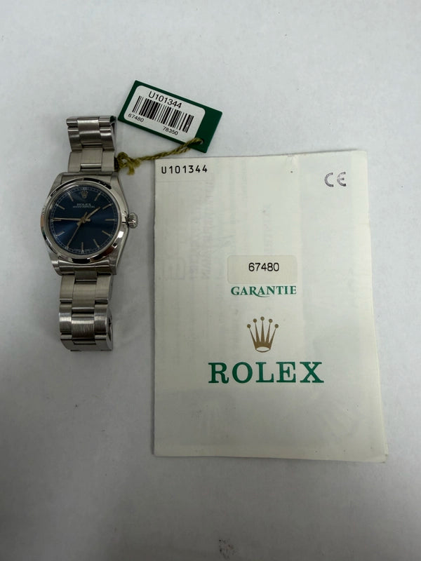 Rolex Oyster Perpetual Blue Stick Dial on Oyster Ref 67480 with Papers 1998