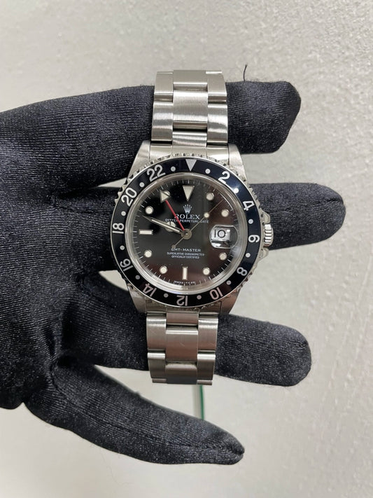 Rolex GMT-Master Black Dial on Oyster Ref 16700 with Papers 1997