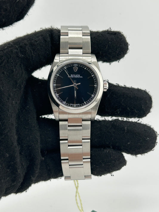 Rolex Oyster Perpetual 31 Black Stick Dial on Stainless Steel Bracelet Ref. 77080 Papers 2006 — view 2