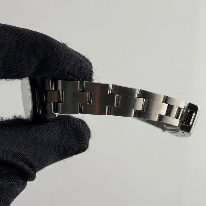 Rolex Oyster Perpetual White Roman Dial on Oyster Ref 67230 with Papers 1997