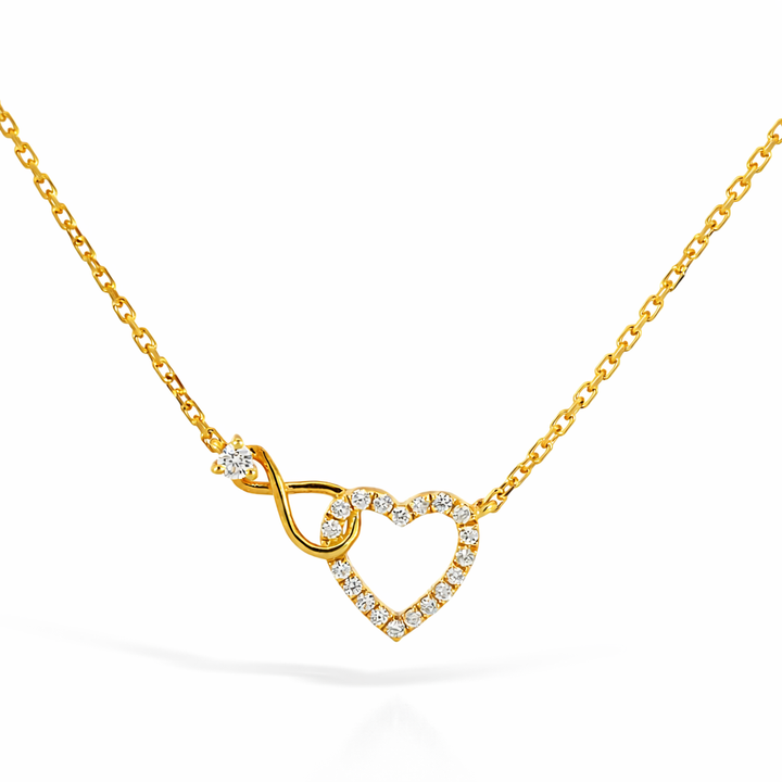 Collar de oro amarillo de 14k con corazón e infinito de diamantes de 0,15 ct