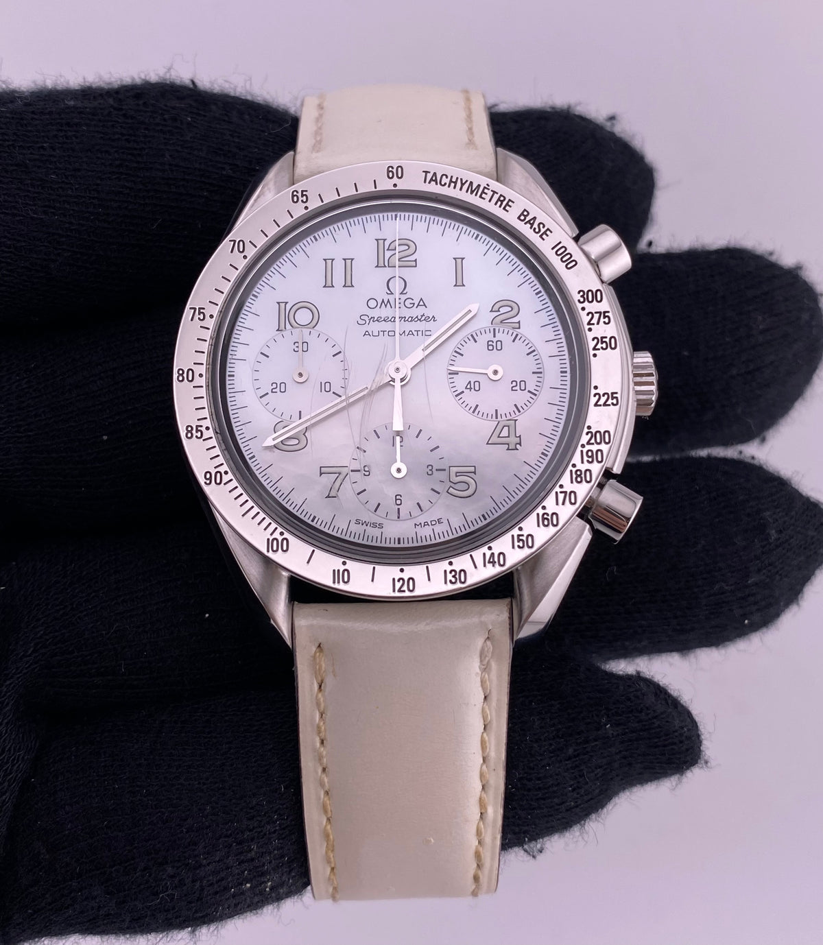 Omega Speedmaster White Mop Dial on Leather Strap Ref. 3802.70.56 Card 2003 — view 2