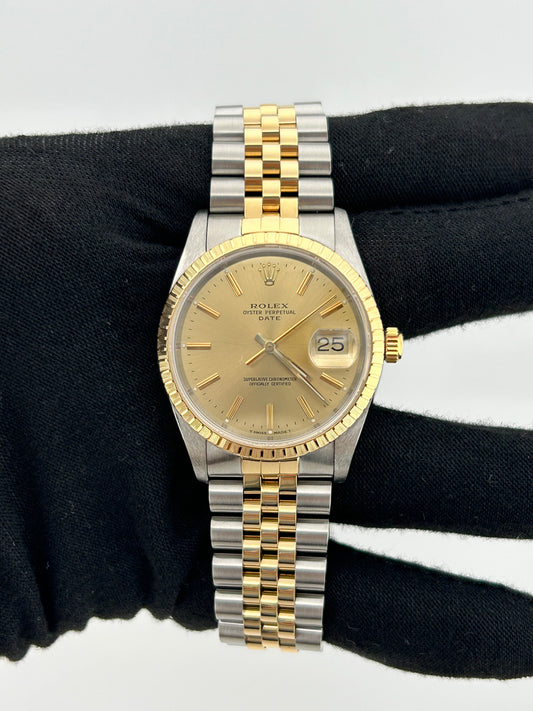 Rolex Oyster Perpetual Date Champagne Stick Dial on Jubilee Ref. 15223