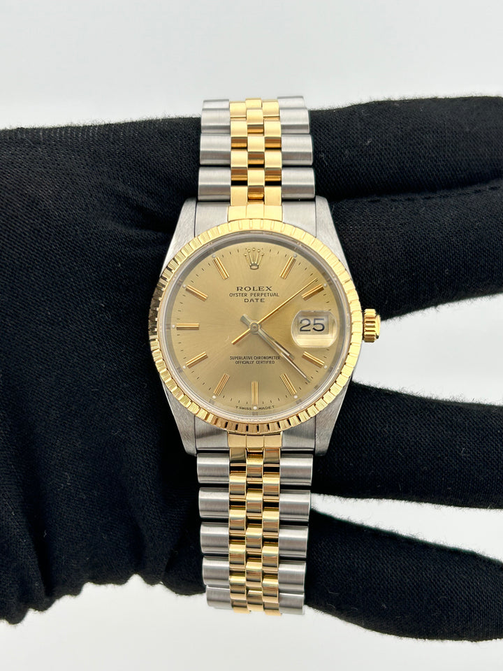 Rolex Oyster Perpetual Date Champagne Stick Dial on Jubilee Ref. 15223