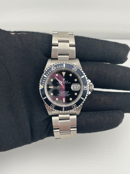 Rolex Submariner Date Black Dial on Oyster Ref. 16610 Papers Open Date — view 2