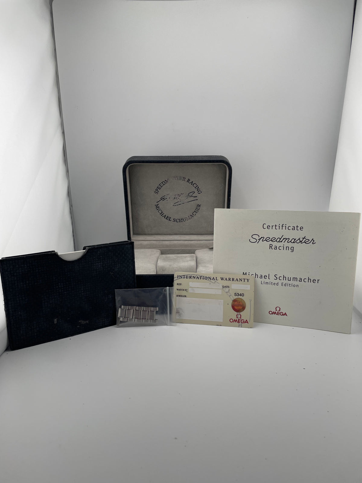 Omega Speedmaster Racing Black Dial on Stainless Steel Bracelet Ref. 3519.50 Complete Open Date — view 7