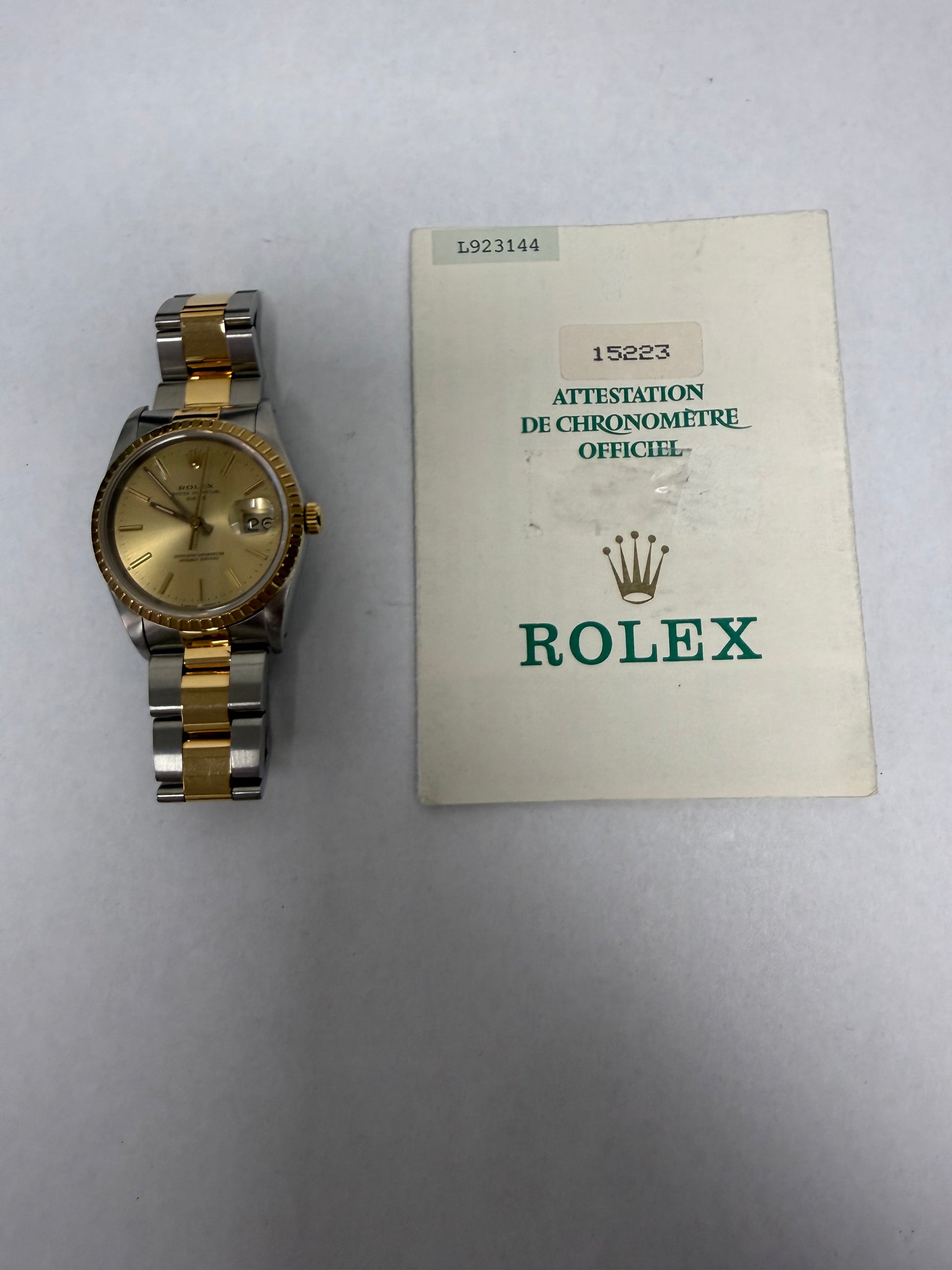 Rolex Oyster Perpetual Date Champagne Stick Dial on Oyster Ref. 15223 Papers 1990 — view 6