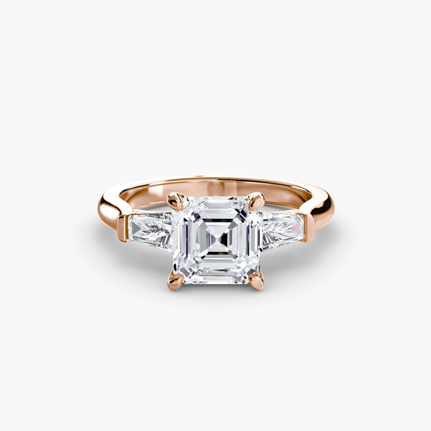 Anillo de tres piedras (piedras laterales baguette)