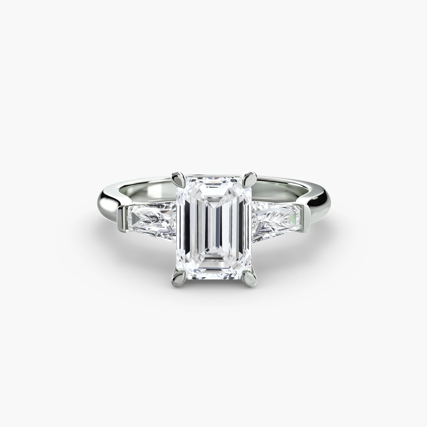 Anillo de tres piedras (piedras laterales baguette)