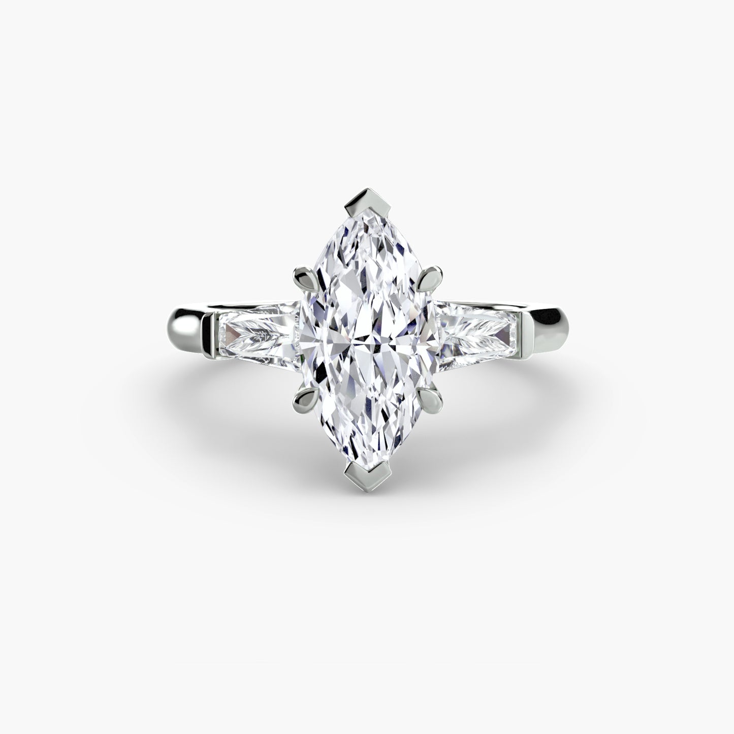 Anillo de tres piedras (piedras laterales baguette)