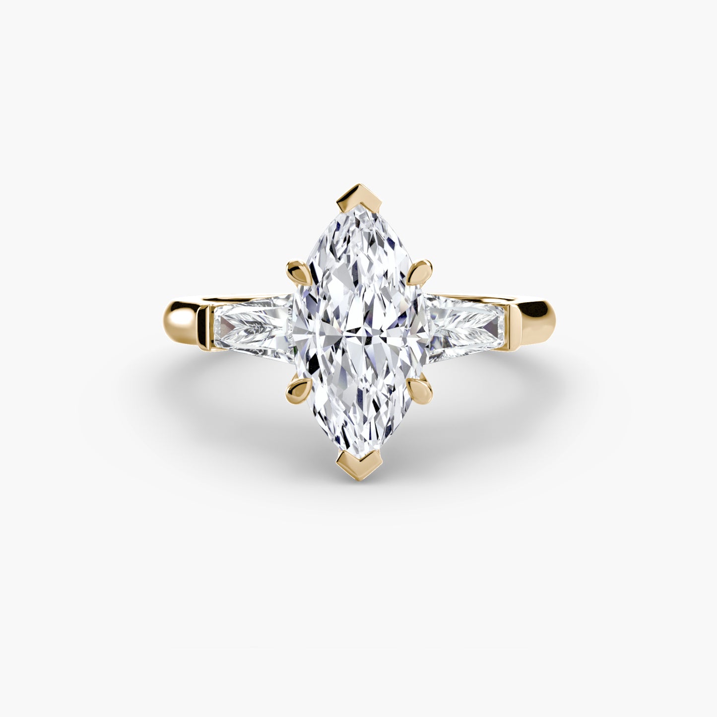 Anillo de tres piedras (piedras laterales baguette)