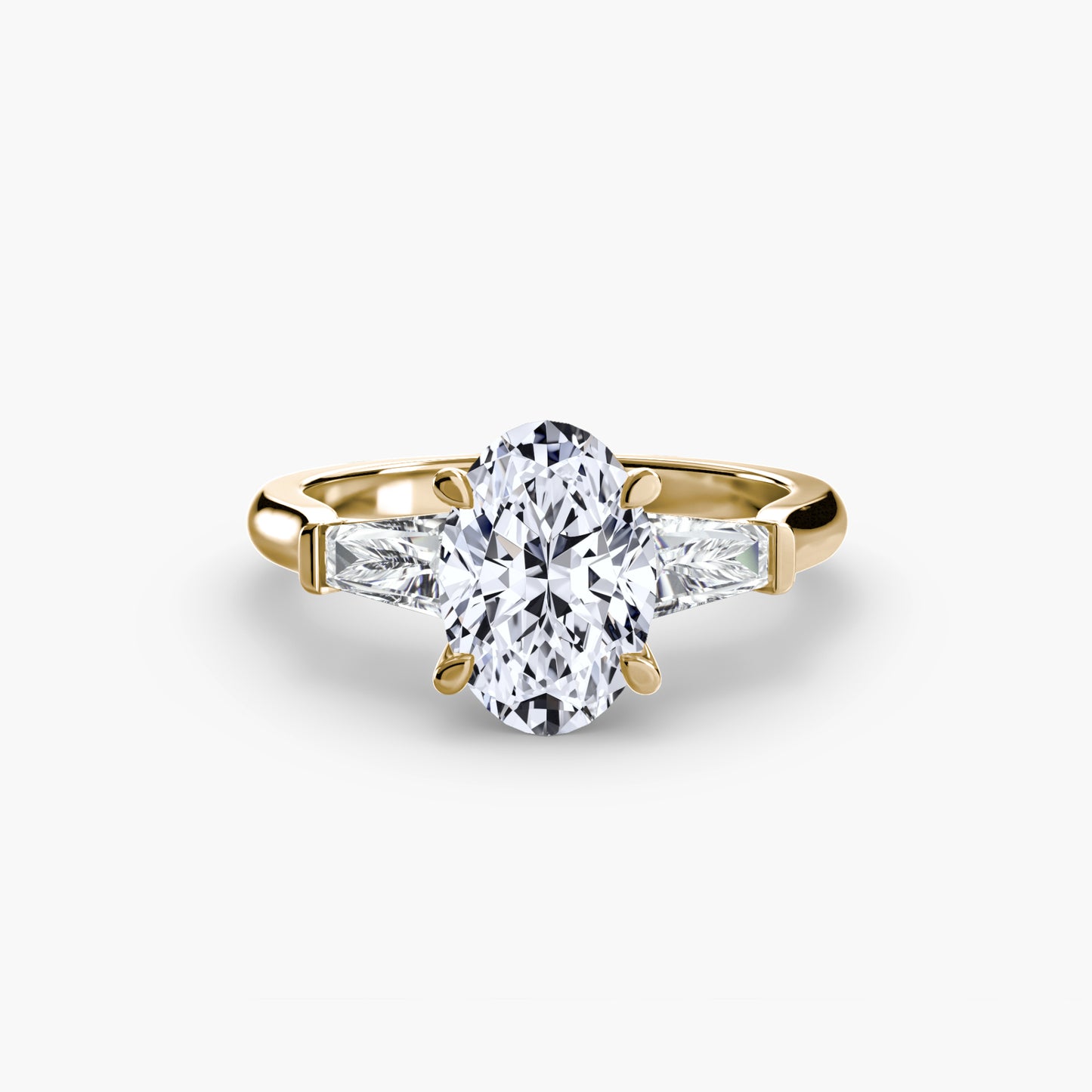 Anillo de tres piedras (piedras laterales baguette)