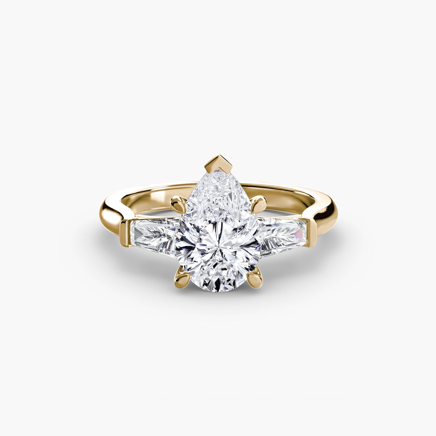 Anillo de tres piedras (piedras laterales baguette)