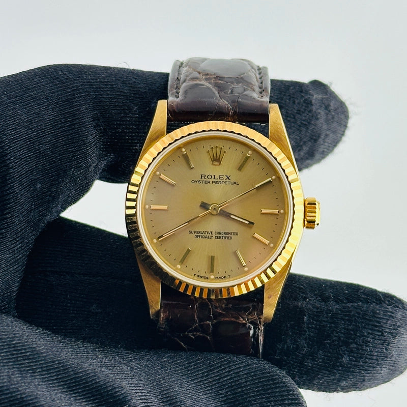 Rolex Oyster Perpetual Champagne Stick Dial on Am Leather Ref 67518