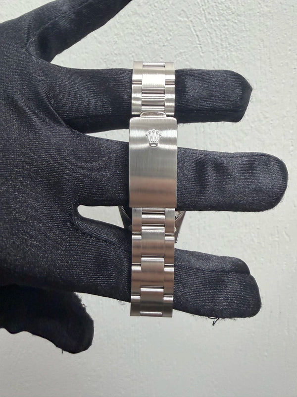 Rolex Oyster Perpetual White Roman Dial on Oyster Ref 67480