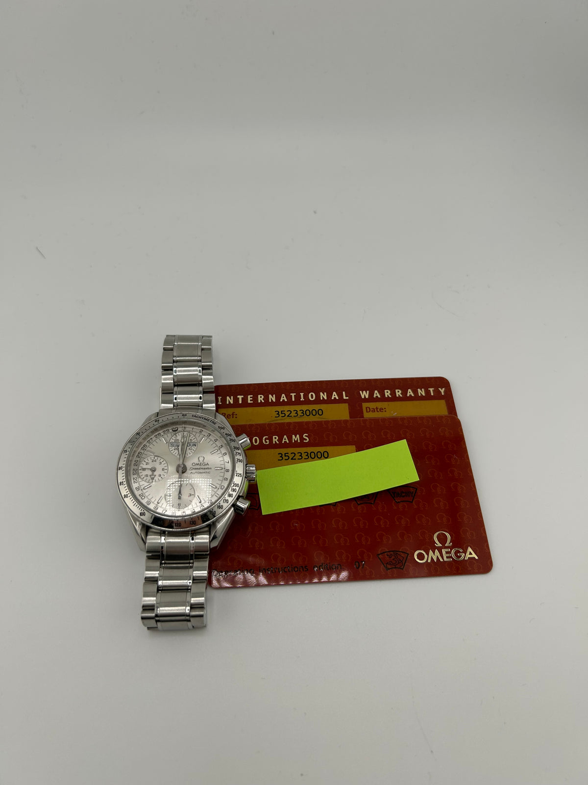 Omega Speedmaster Day Date Silver Dial on Stainless Steel Bracelet Ref. 3523.30.00 Card — view 7