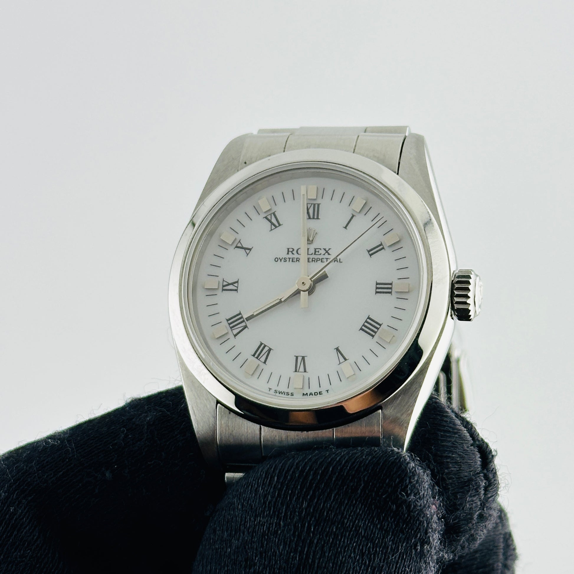 Rolex Oyster Perpetual White Roman Dial on Oyster Bracelet Ref. 67480 Papers 1997 — view 3