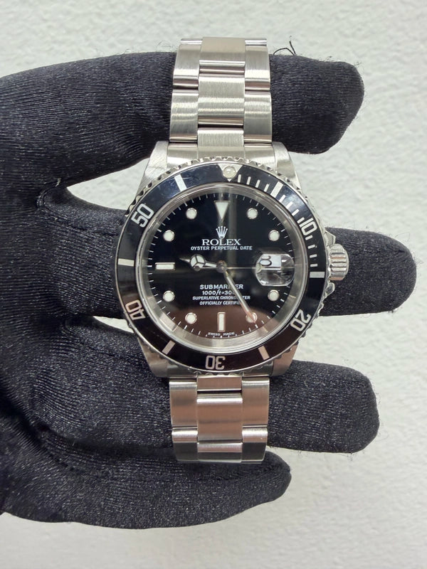 Rolex Submariner Black Dial on Oyster Ref 16610 with Papers 1999