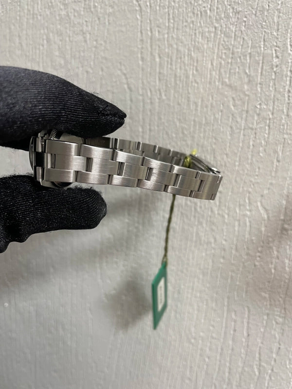 Rolex Oyster Perpetual Black Dial on Oyster Ref 67180 with Papers 1995