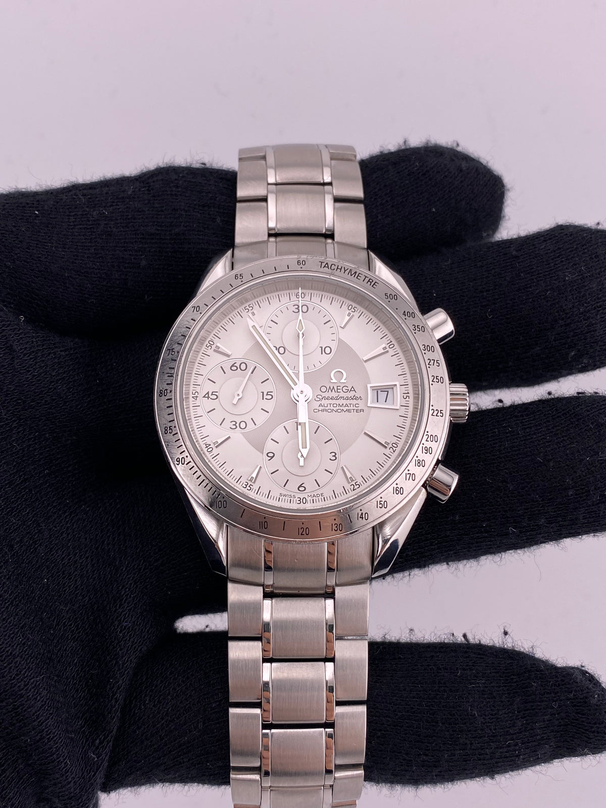 Omega Speedmaster Date/Day‑Date Silver Dial on Stainless Steel Bracelet Ref. 3211.30 Card 2011 — view 2