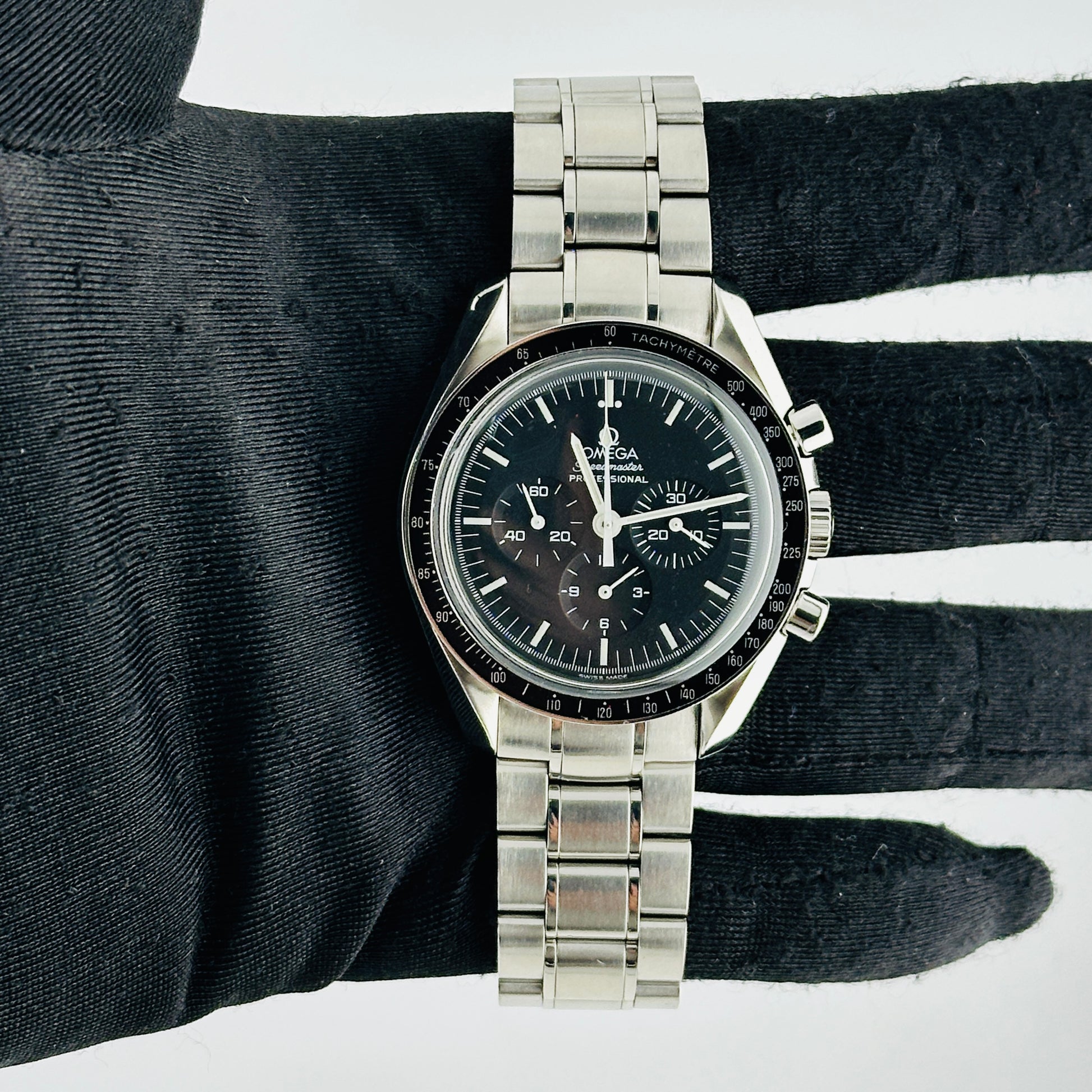 Omega Speed Master Black Index Dial on Stainless Steel Bracelet Ref. 3570.50.00 Card Open Date — view 2