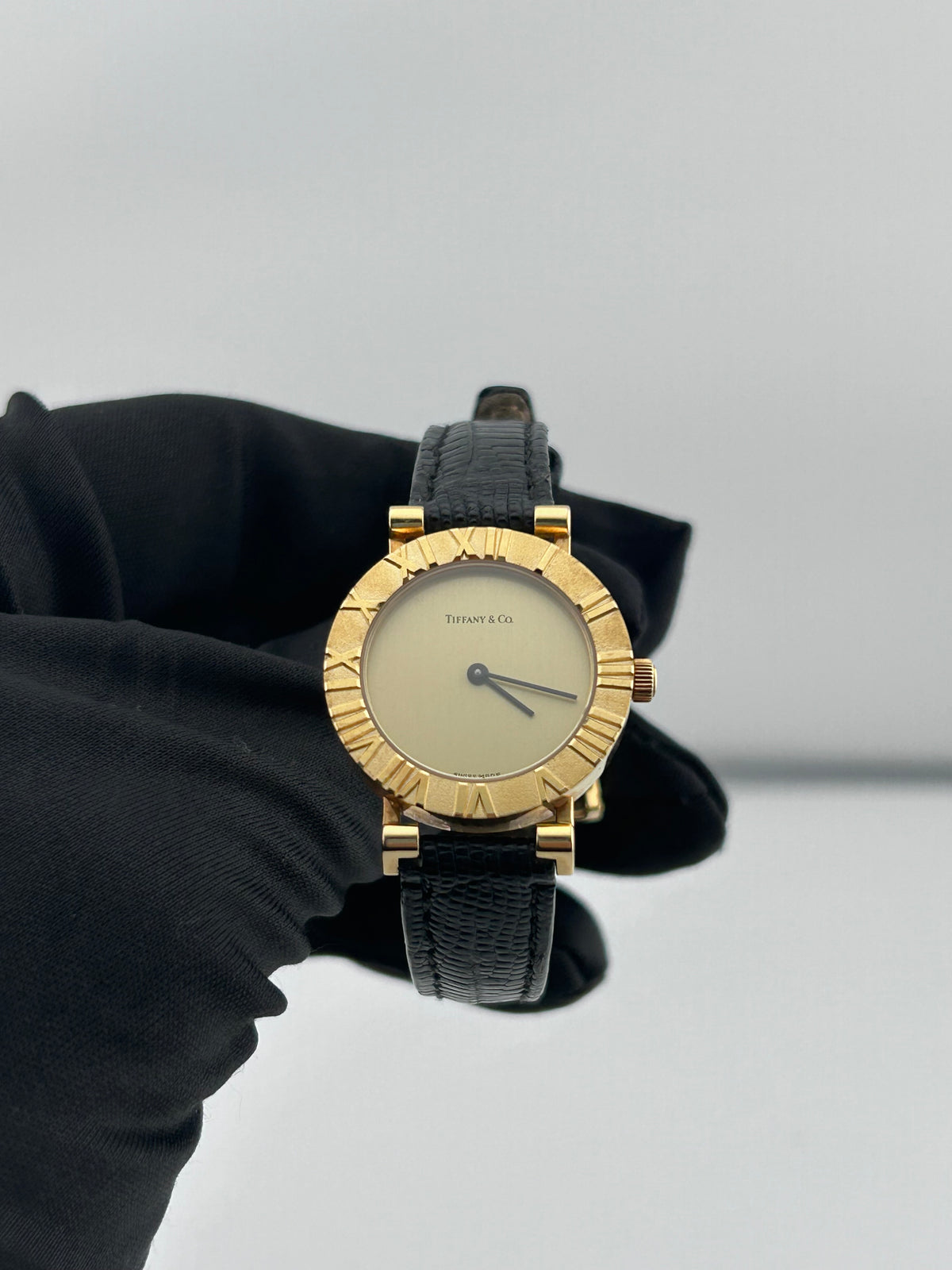 Tiffany & Co. Atlas Gold Dial on Black Leather Strap Ref. L0630 — view 2
