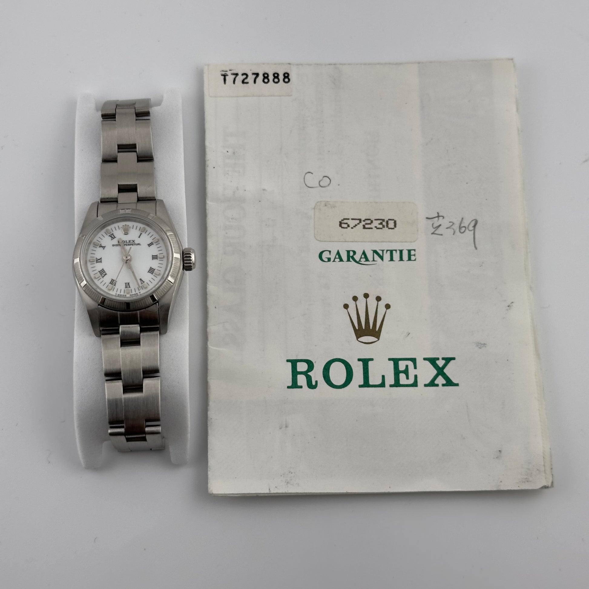 Rolex Oyster Perpetual White Roman Dial on Oyster Ref. 67230 Papers 1997 — view 5