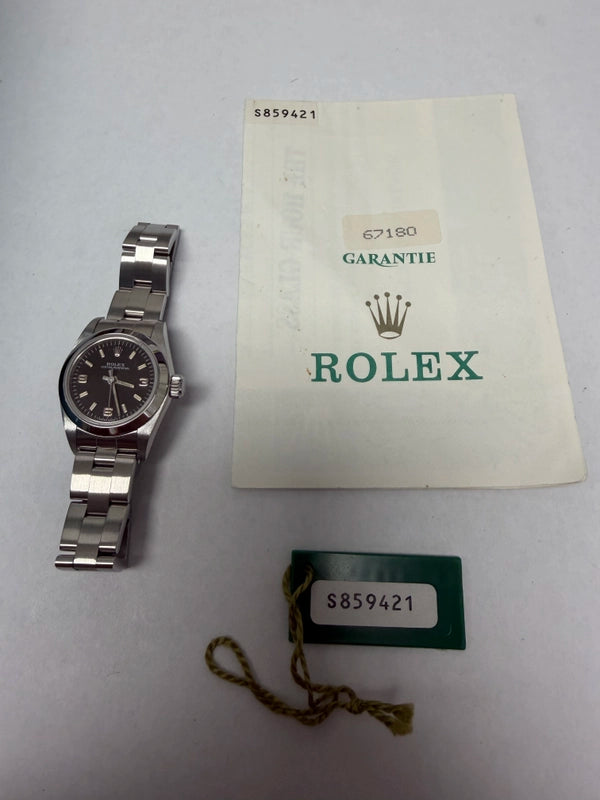 Rolex Oyster Perpetual Black Dial on Oyster Ref 67180 with Papers 1995