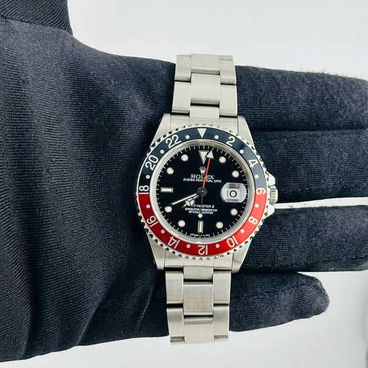 Rolex GMT-Master II Coke Black Dial on Oyster Ref 16710 with Papers 1996