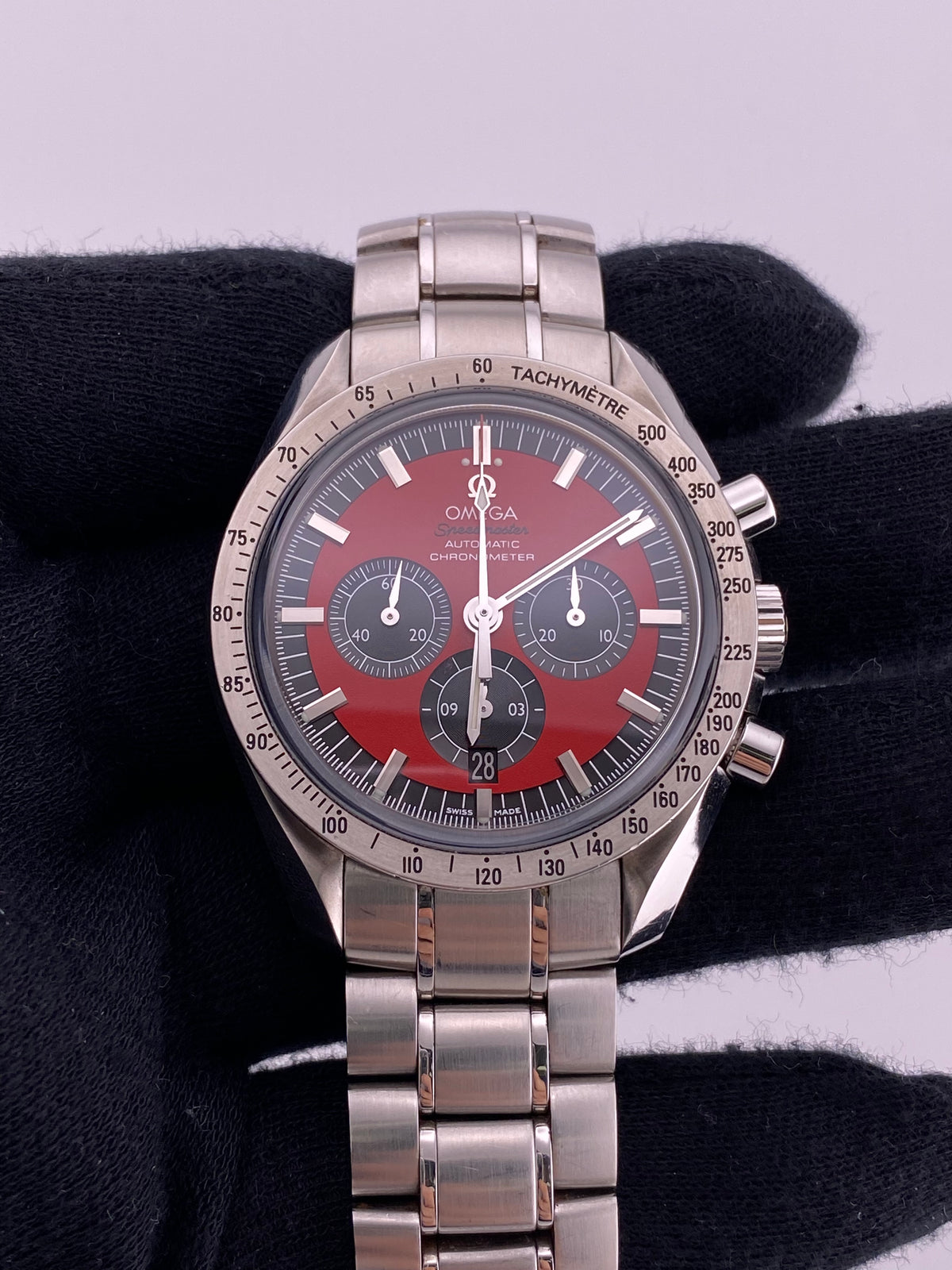 Omega Speedmaster Red Dial on Stainless Steel Bracelet Ref. 3506.61 Card 2006 — view 2