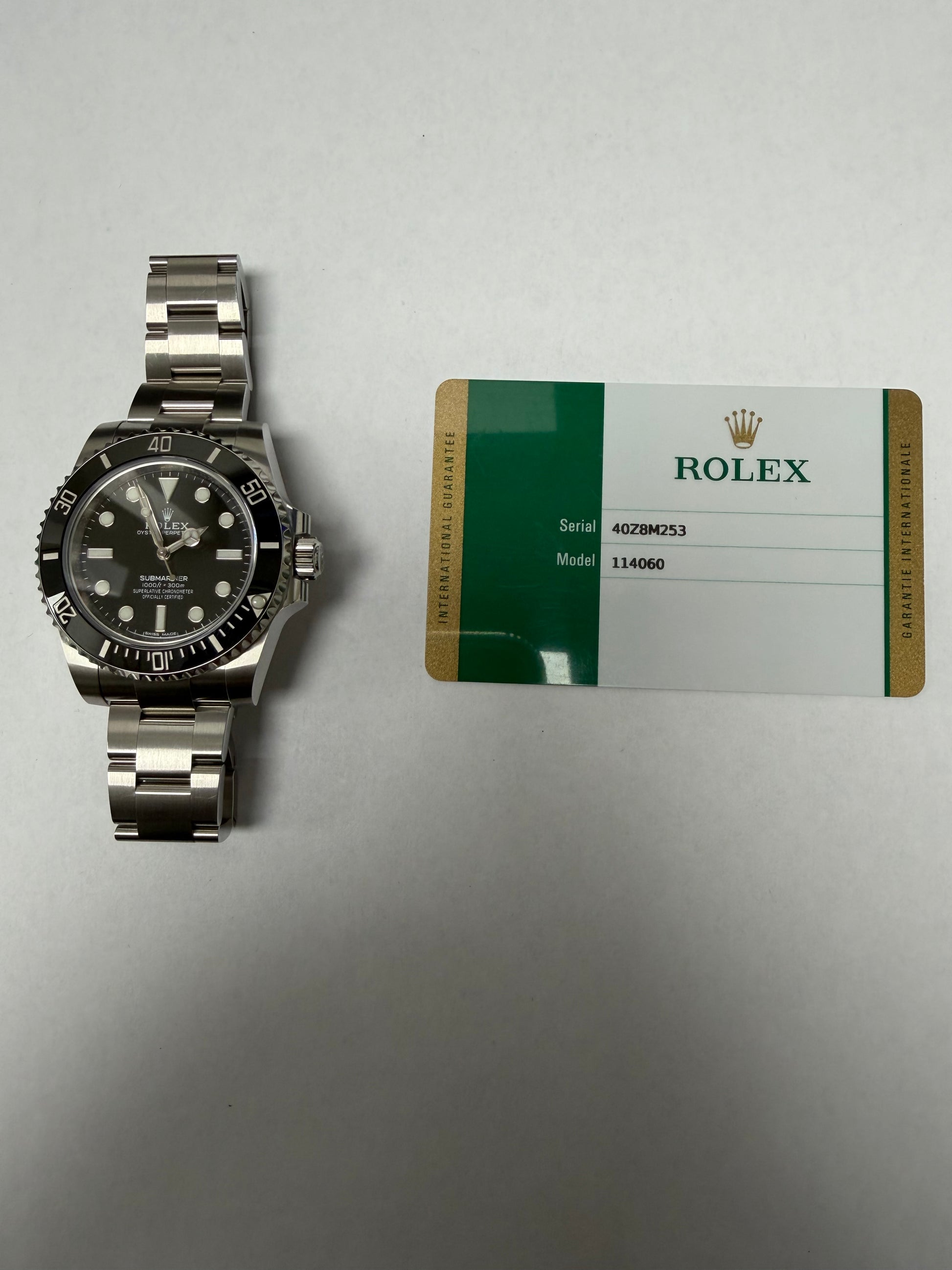 Rolex Submariner No-Date Black Dial on Oyster Ref. 114060 Card 2019 — view 5