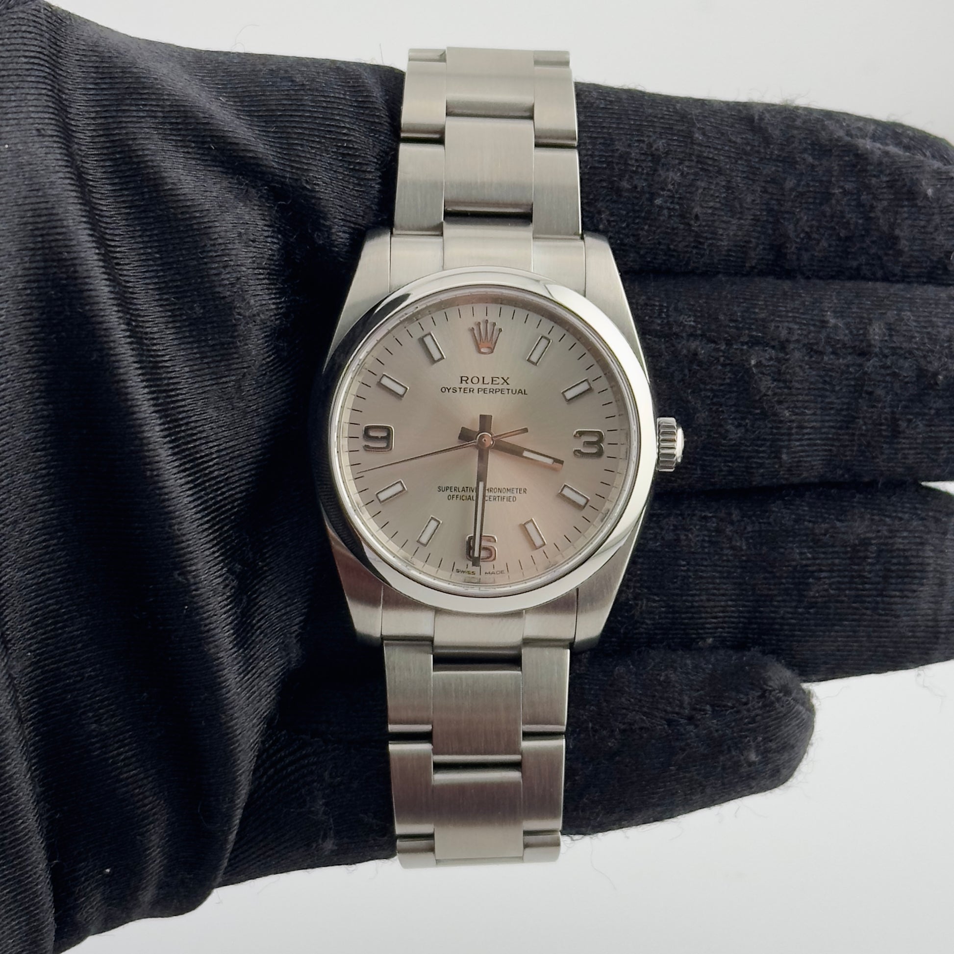Rolex Oyster Perpetual Silver Dial on Oyster Ref. 114200 2010
