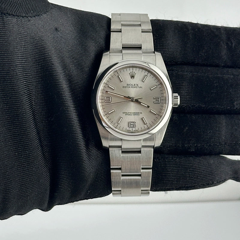 Rolex Oyster Perpetual Silver Dial on Oyster Ref 116000 with Card Old Green 2014