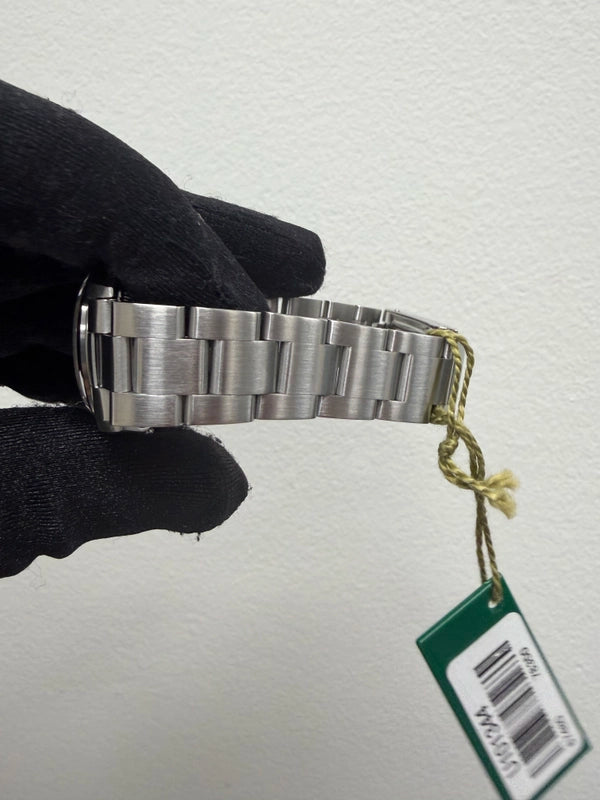 Rolex Oyster Perpetual Blue Stick Dial on Oyster Ref 67480 with Papers 1998