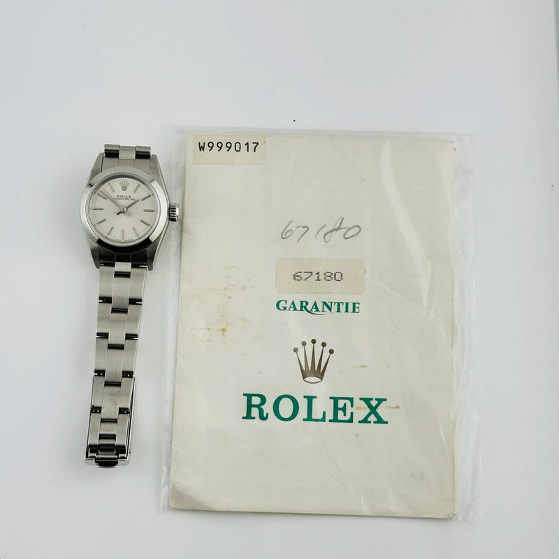 Rolex Oyster Perpetual Silver Dial on Oyster Ref 67180 with Papers 1996