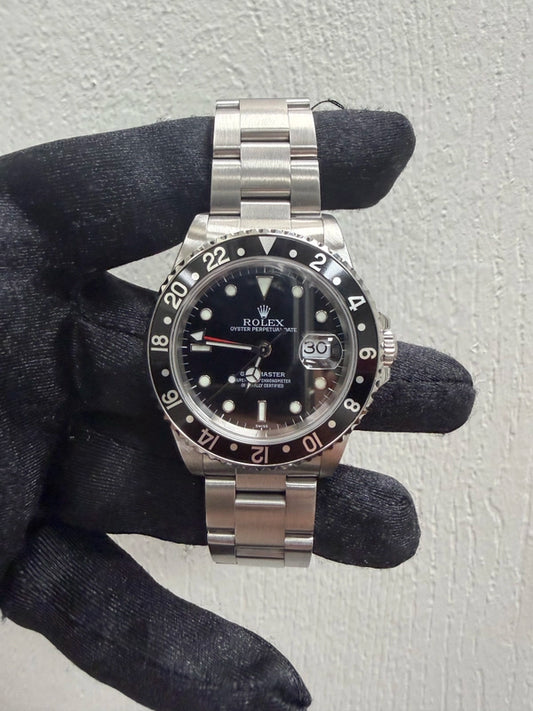 Rolex GMT-Master Black Dial on Oyster Ref 16700 with Papers 1999