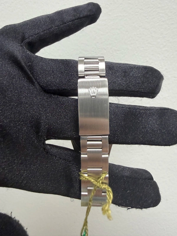 Rolex Oyster Perpetual Blue Stick Dial on Oyster Ref 67480 with Papers 1998