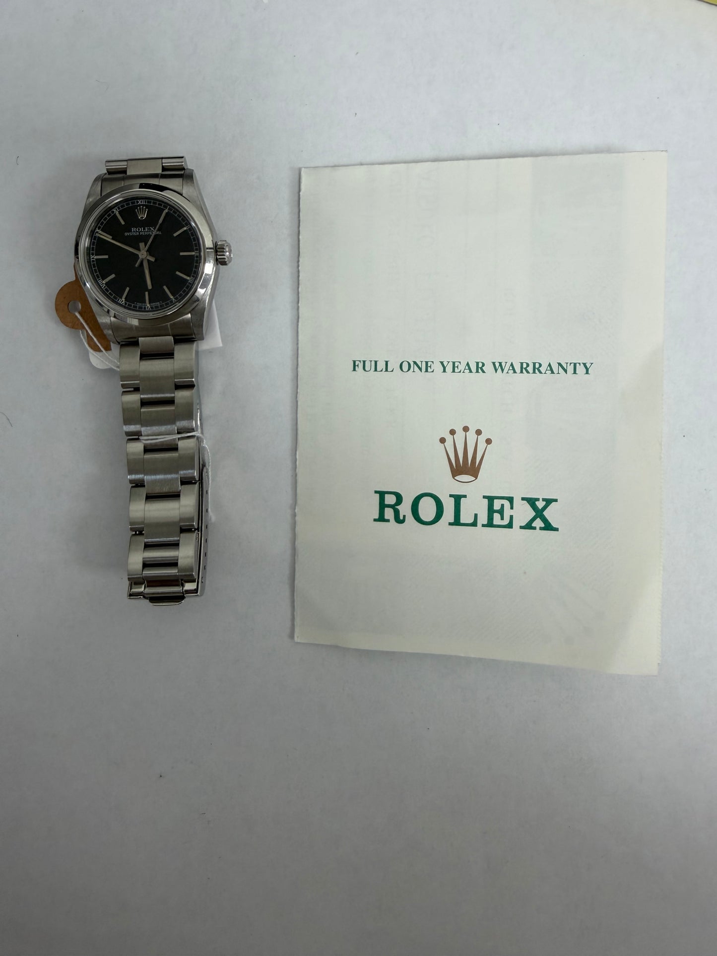 Rolex Oyster Perpetual Black Dial on Oyster Ref. 67480 Papers 1999 — view 5