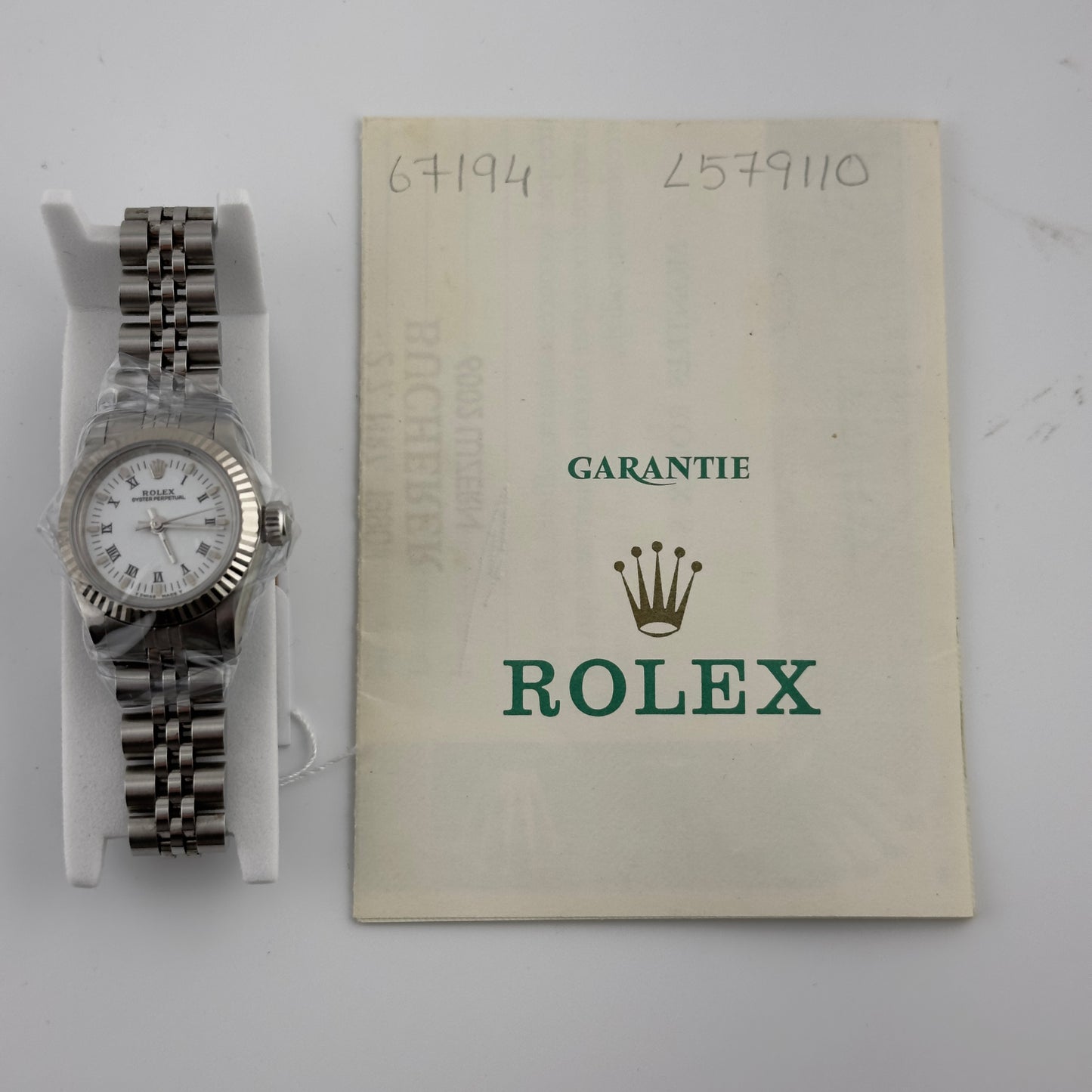 Rolex Oyster Perpetual White Roman Dial on Jubilee Ref. 67194 Papers 1990 — view 4