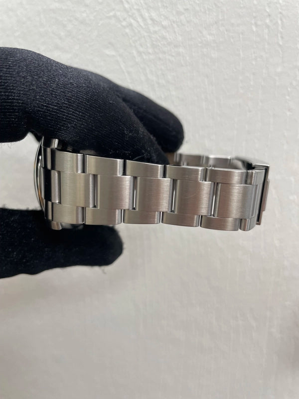 Rolex Oyster Perpetual Silver Dial on Oyster Ref 116000 with Card Old Green 2015