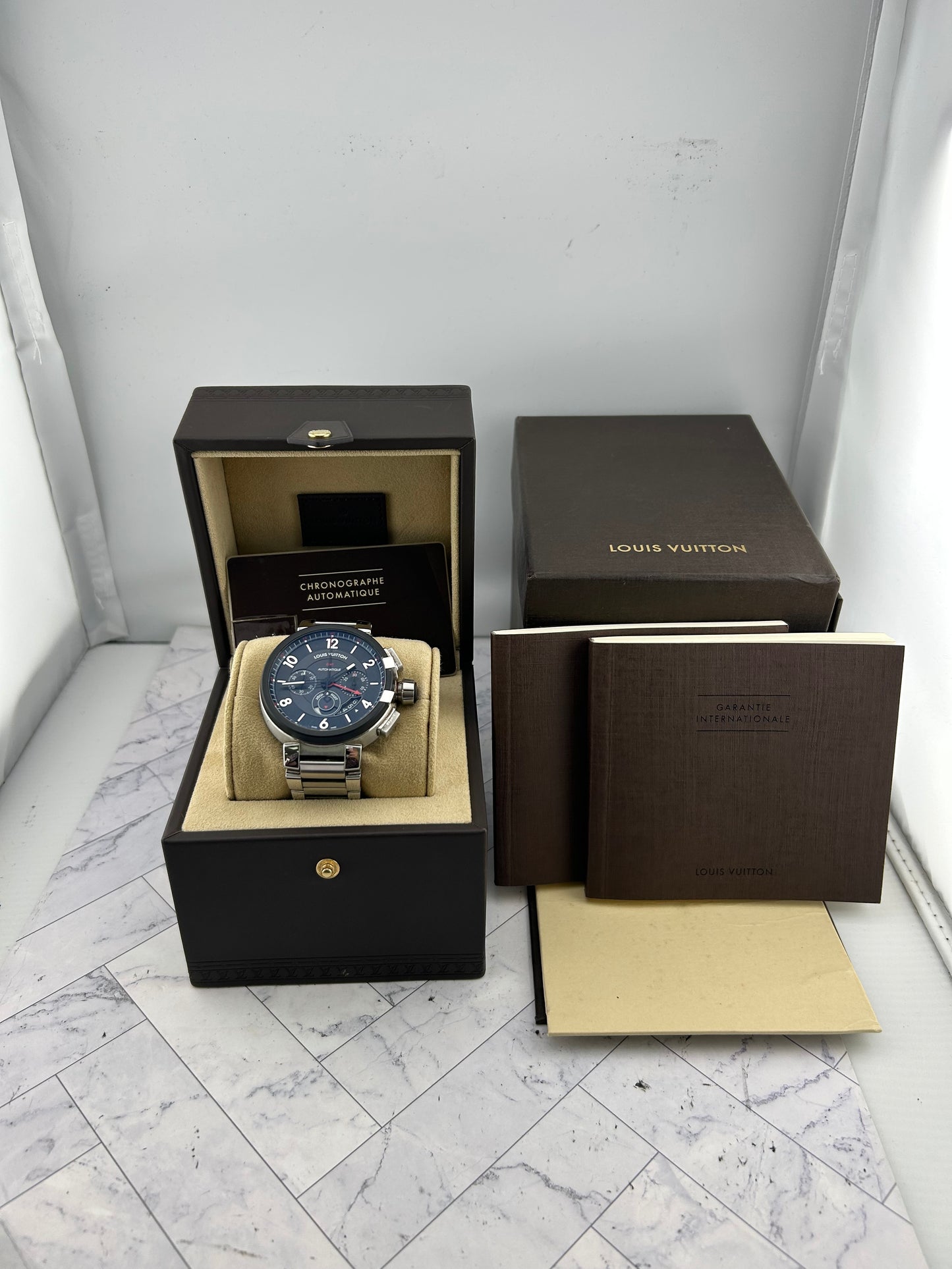 Louis Vuitton Tambour Chronograph GMT Black Dial on Stainless Steel Bracelet Ref. Q1052 Papers 2016 — view 7