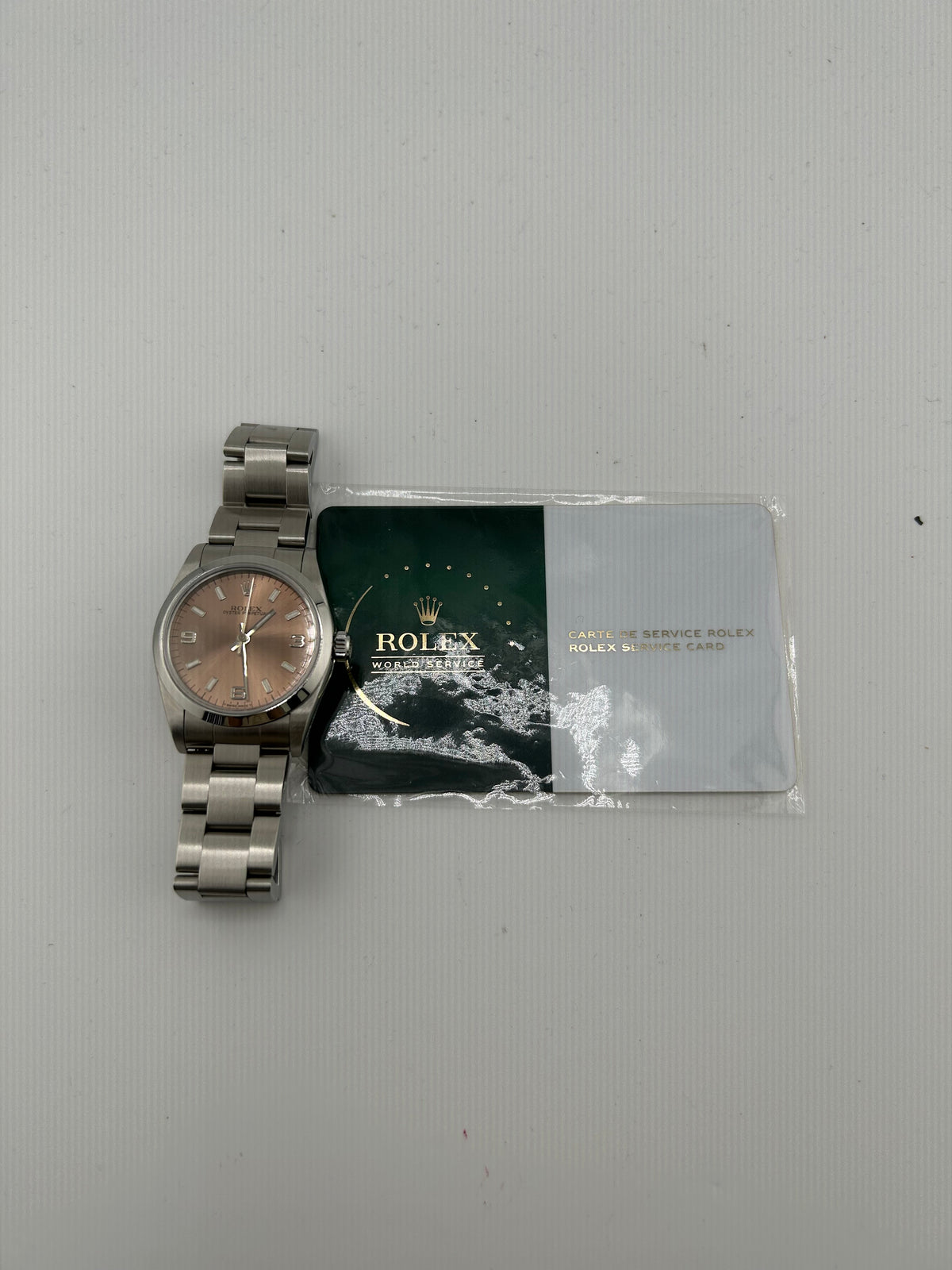 Rolex Oyster Perpetual Salmon Pink Dial on Stainless Steel Bracelet Ref. 67480 1997 — view 7