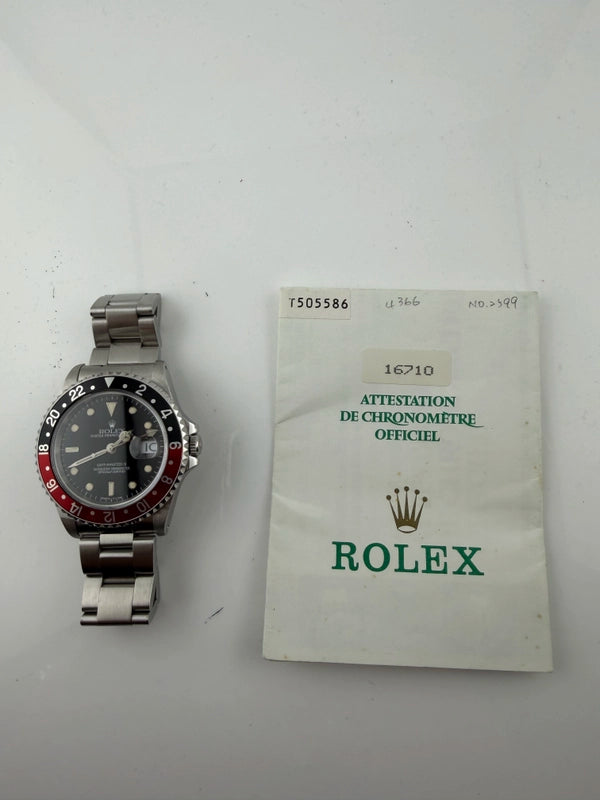 Rolex GMT-Master II Coke Black Dial on Oyster Ref 16710 with Papers 1996